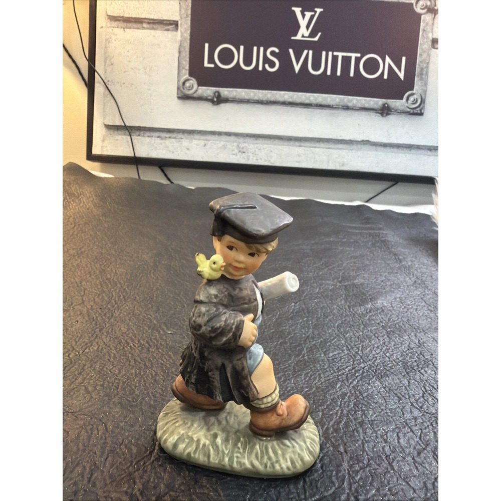 Goebel Hummel figurines- "The Sky's the Limit" -BH 71-1999-Thailand Graduate 99